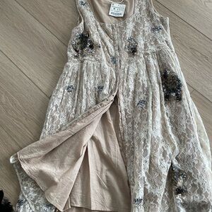 Lace women’s dress in lace and sequins.